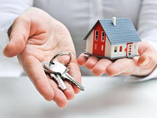 tiny house next to a set of keys